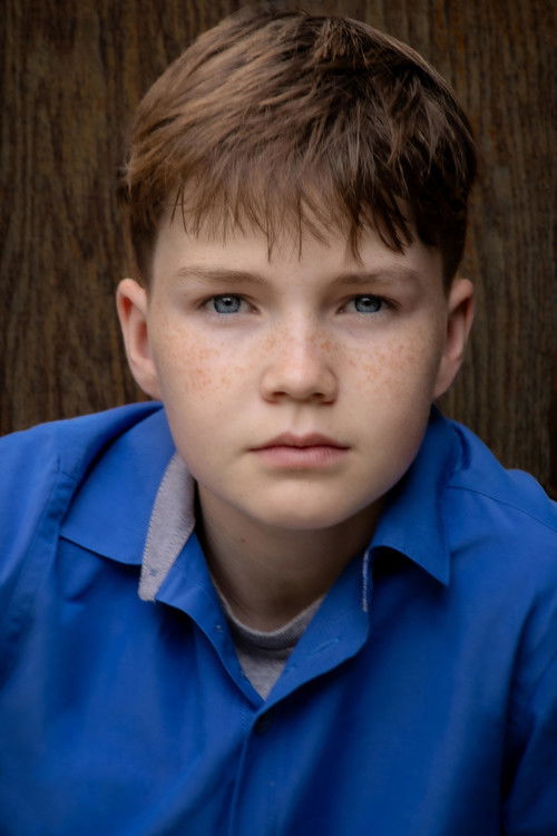Jake Cogman as Young Scarecrow