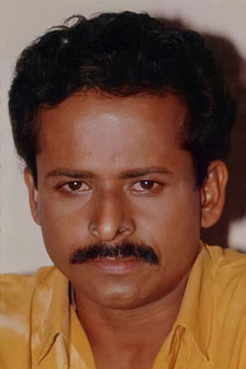 Bobby Kottarakkara as Charlie