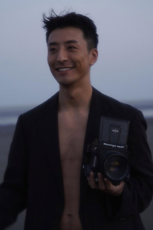 Du Bai as The Sunglasses