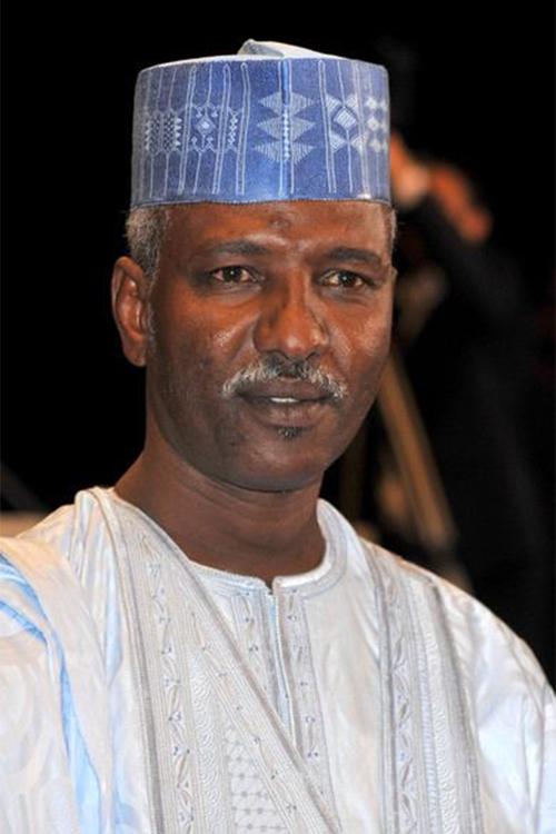 Youssouf Djaoro as Adam 'Champion' Ousmane