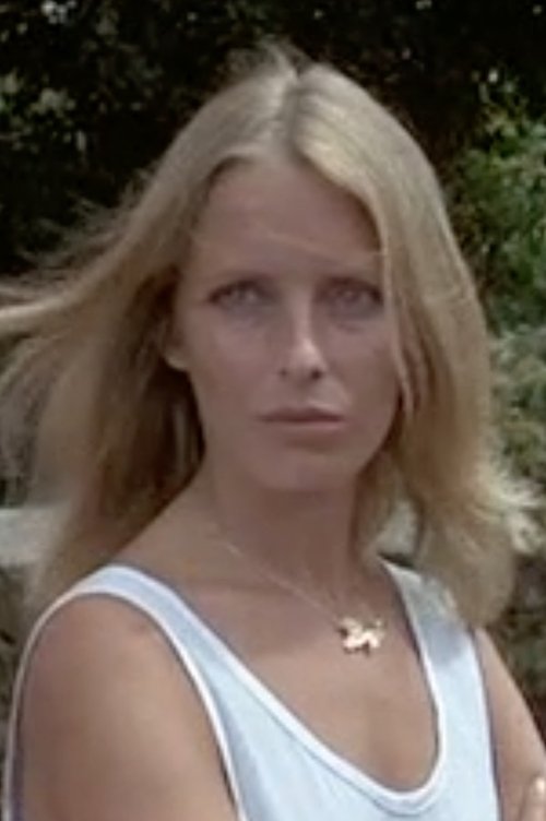 Julie Depouilly as Josépha, FR3 presenter