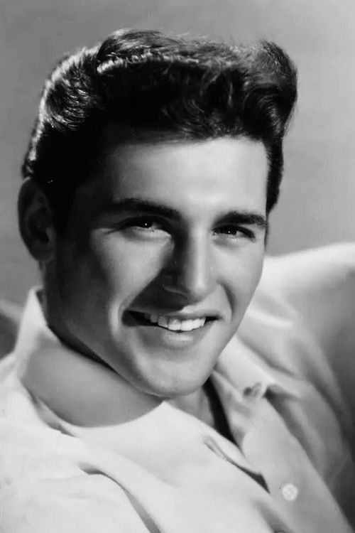 Trax Colton as Spiridon Loues