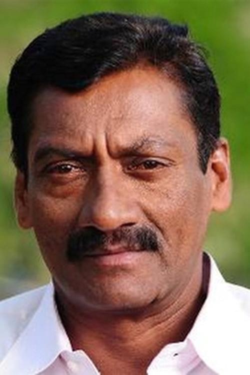 Chembil Ashokan as Tony's Father