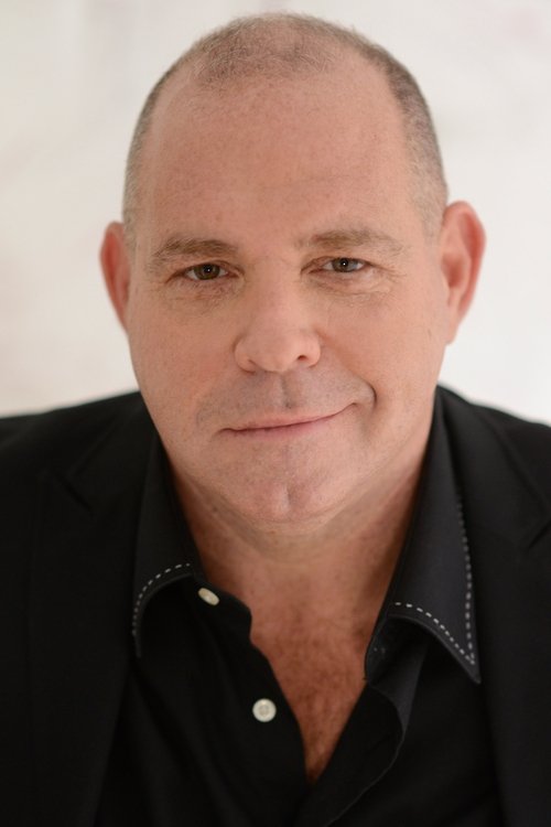 Louis Lombardi as Strausz