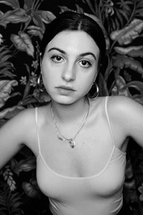 Savannah Gisleson as The Host