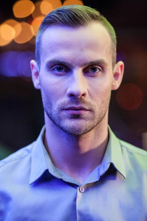 Bartosz Porczyk as Adam Wysocki