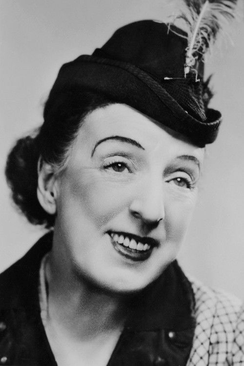 Nellie Wallace as Mrs. Beasley