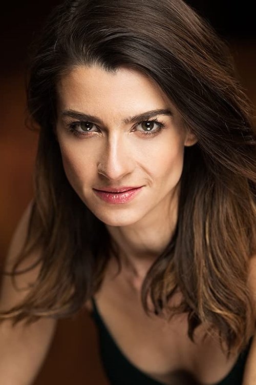 Sadie Silcock as Mrs. Bell