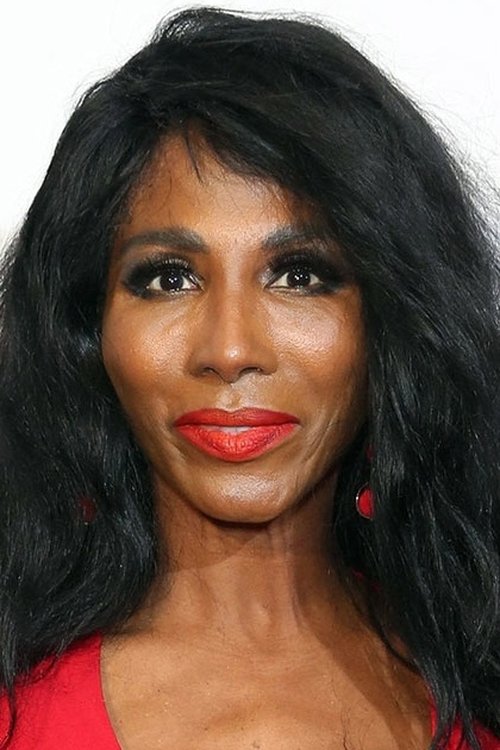 Sinitta as Quilt Documentary Narrator (voice)