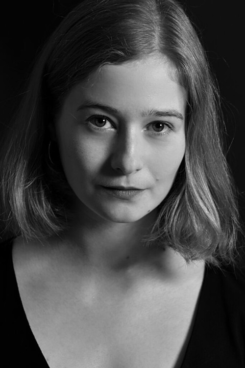 Ági Bartos as hostess