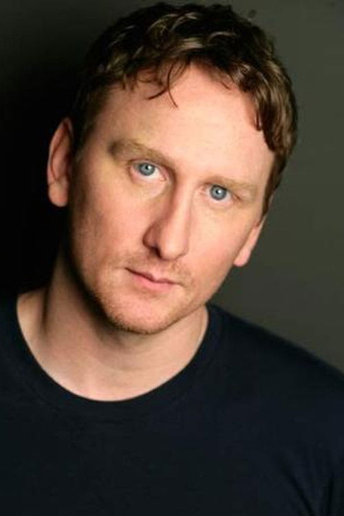 Justin Swain as Interviewing Manager