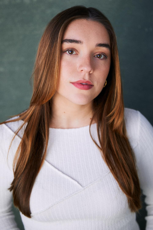 Oriana Bustamante as Old Time Fun Town Employee