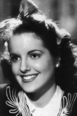 Maria Eugénia as Geninha, a Menina da Rádio