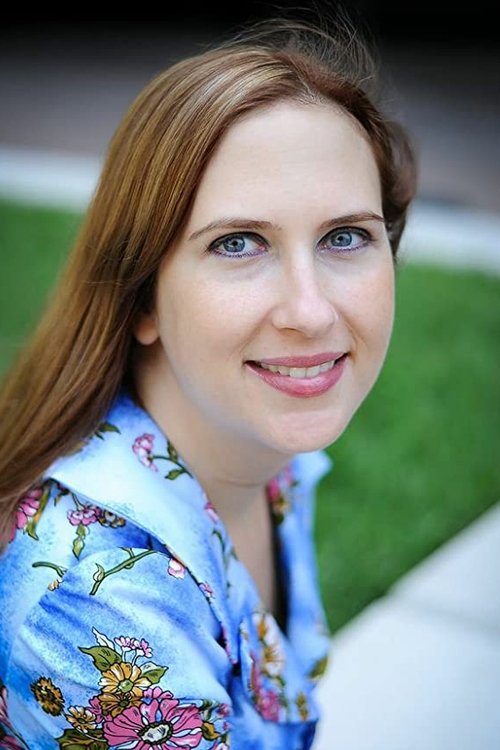 Rebecca Chulew as Football Fan (uncredited)