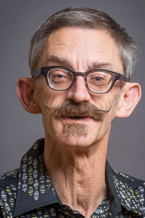 Ian Harcourt as Kenny (Bus Driver)