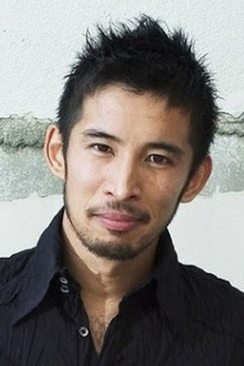 Minoru Matsumoto as Crazy Yakuza with Amulet