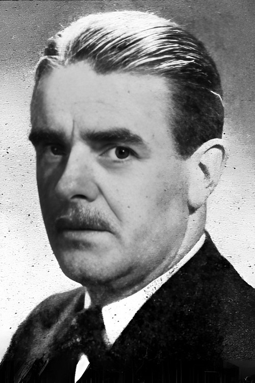 Norman Shelley as Mr. Wilson