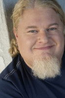 Greg Baker as The Maverick Editor