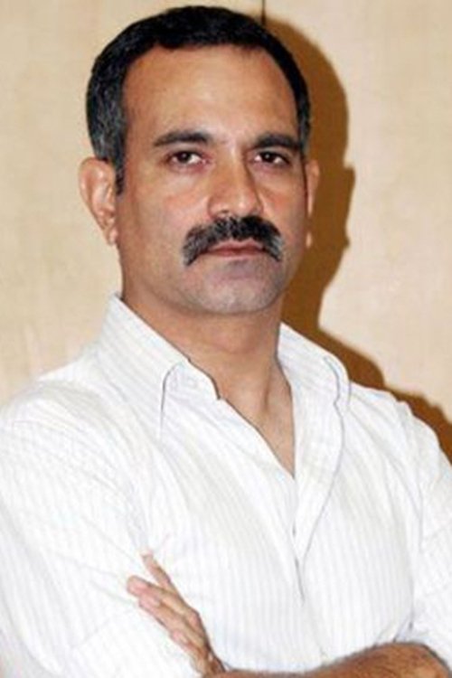 Manish Choudhary as Dharmesh Zaveri / Rajan Zakaria