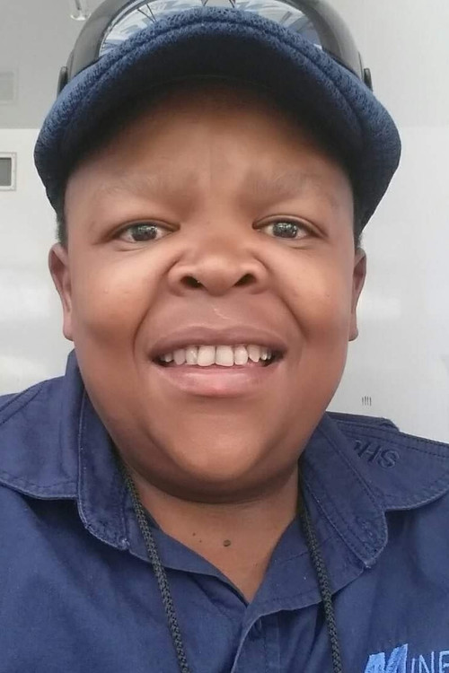 Alfred Ntombela as Minister Mda