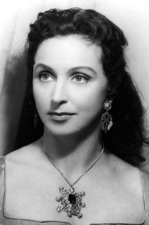 Judith Holzmeister as Mrs. Pettigrew