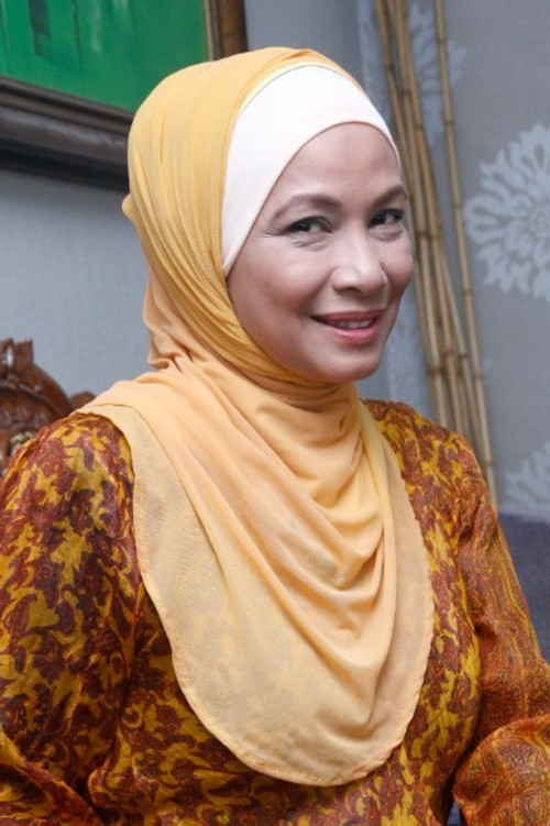 Aida Khalida as 