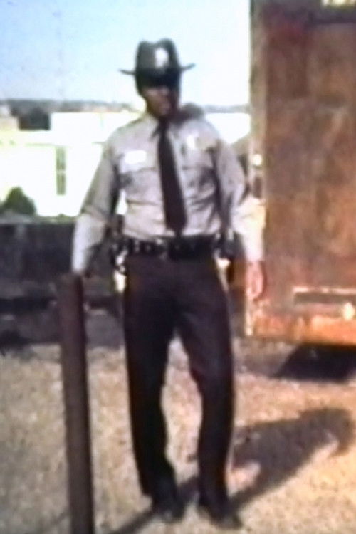 Raymond Goodall as Police officer