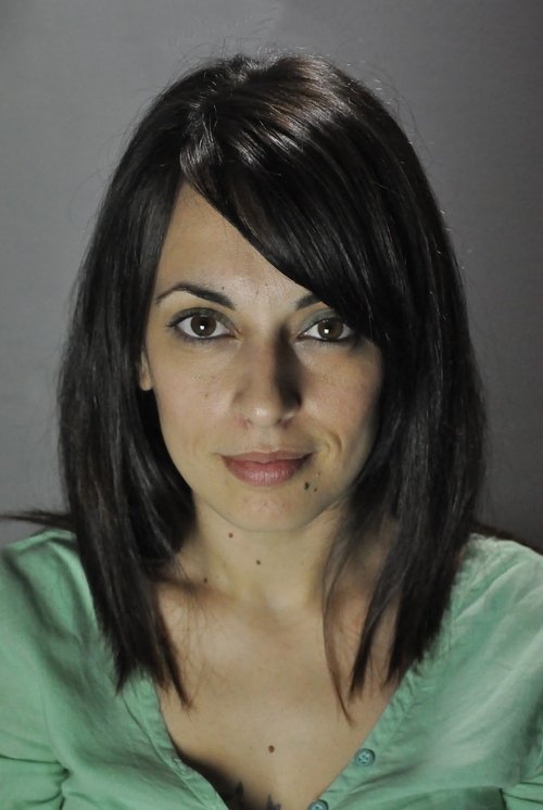 Afroditi Georgousi as Woman #1