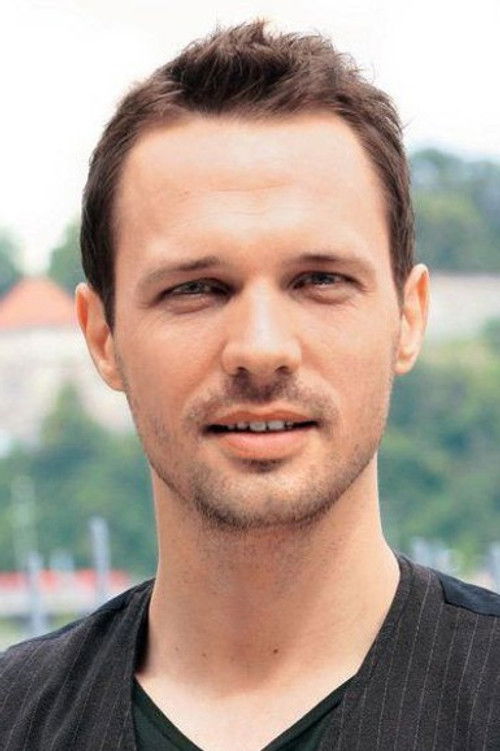 Martin Rausch as Host