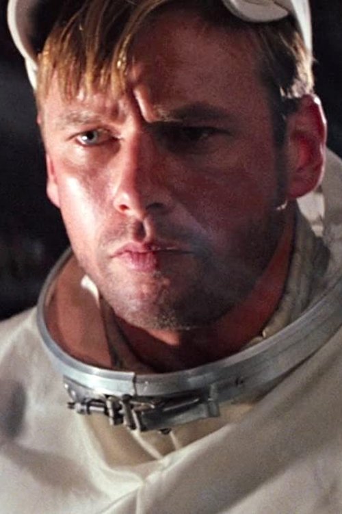 John Morton as Airline Pilot