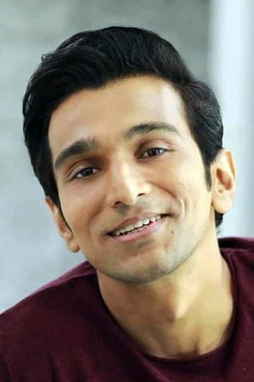 Pratik Gandhi as Suraj Yadav