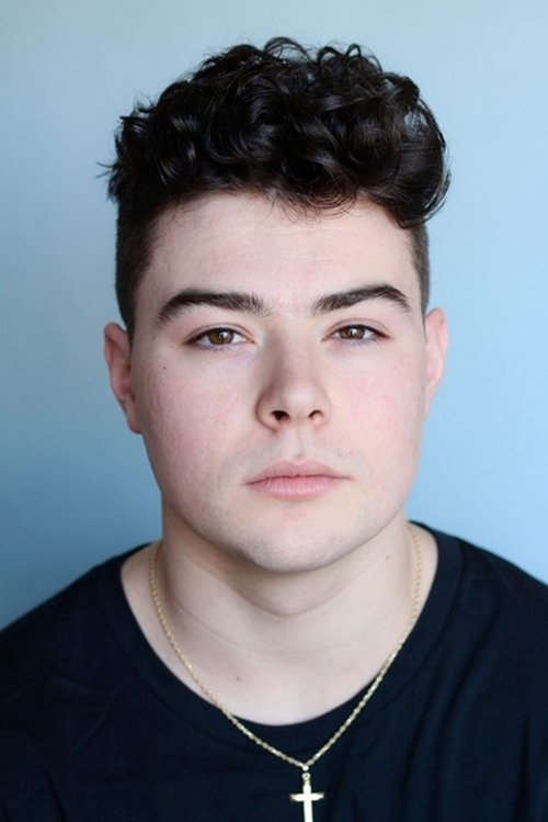 Oscar Wahlberg as Boy with Glasses