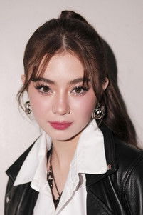 Fyang Smith as DJ Elle (segment "2025")