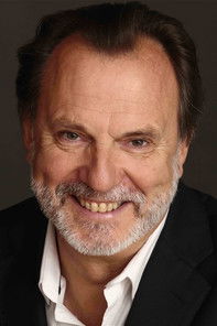 Philippe Roullier as Professor Michel Garron, a neighbor