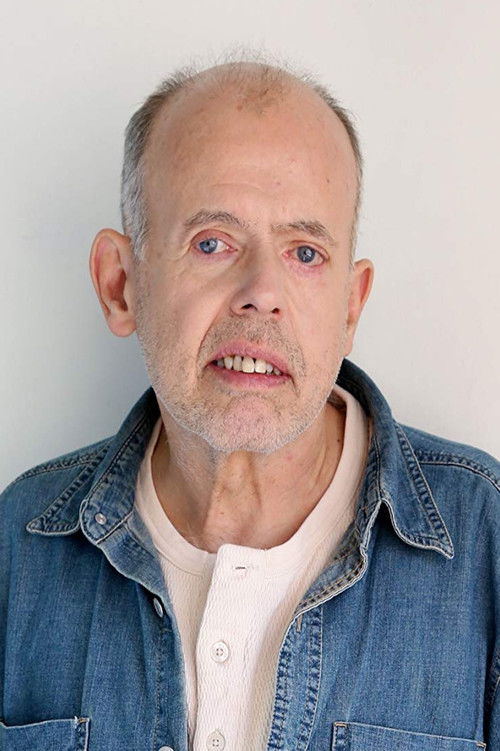 Carl Paul Ezold Jr. as Hank