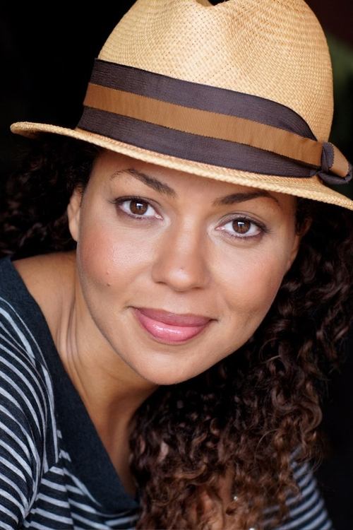 Kathryne Dora Brown as Holly