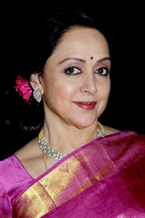Hema Malini as Asha, Raju's wife