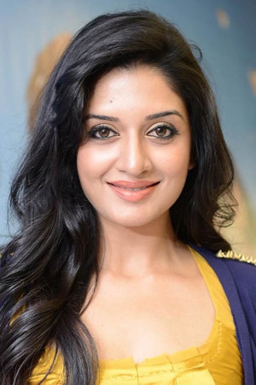 Vimala Raman as Raja Rajendra's wife
