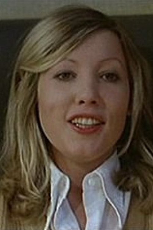 Evelyne Thomas as Dominique