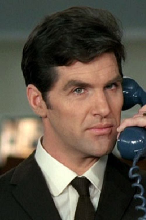 Edward Brayshaw as Léon Colbert