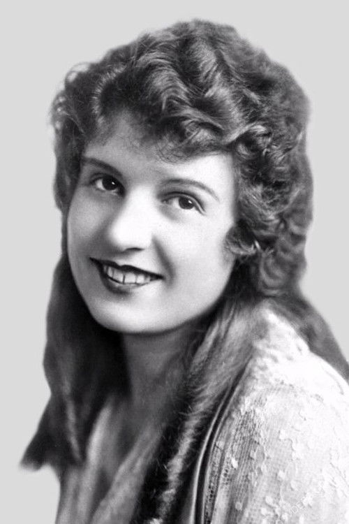 Gretchen Hartman as Margaret, his Wife