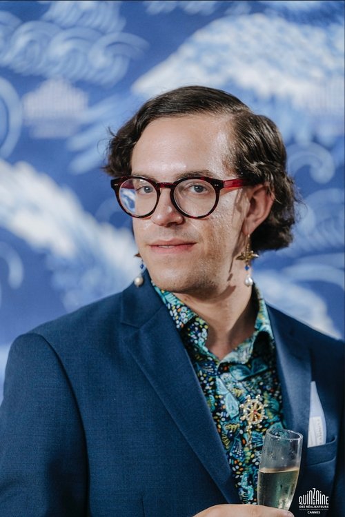 Miles Emanuel as American