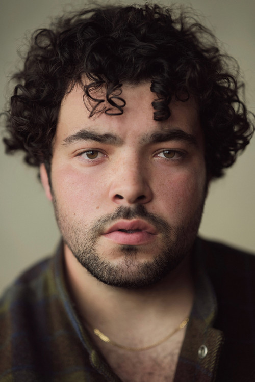 Dylan Corbett-Bader as Men's Group Member