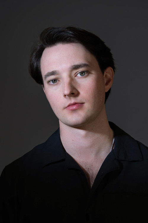 Zach Attwood as Travis