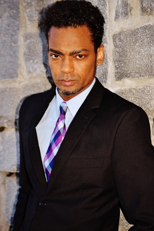 Trevor David as Director