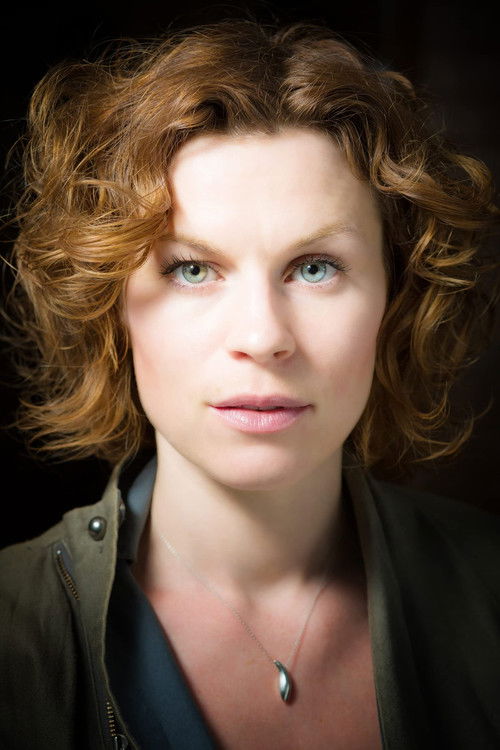 Nathalie Pownall as Cocktail Party Host