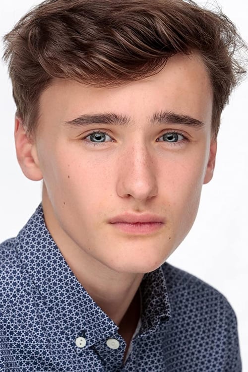 Xavier Atkins as Boy on Bicycle