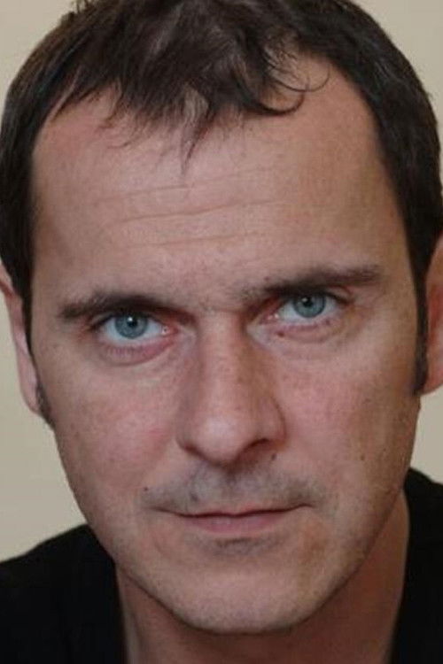 Yves Nadot as Singer