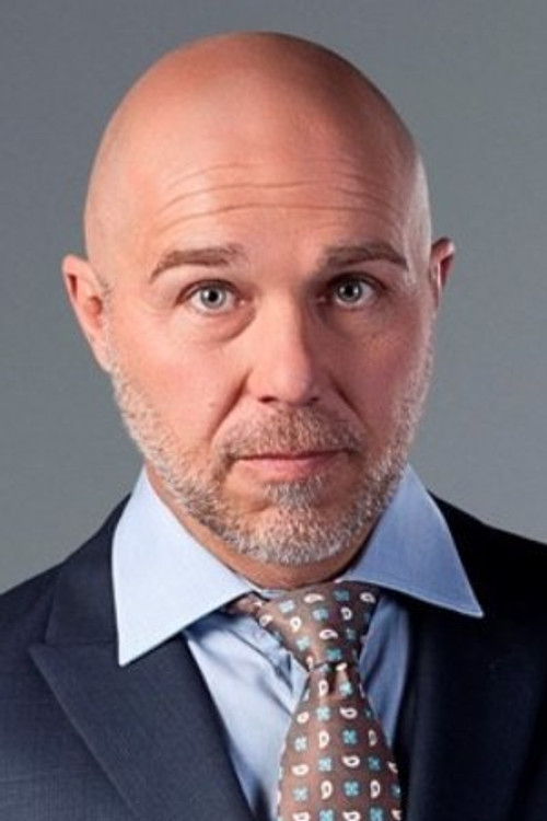 Justin Strydom as Coach Viljoen