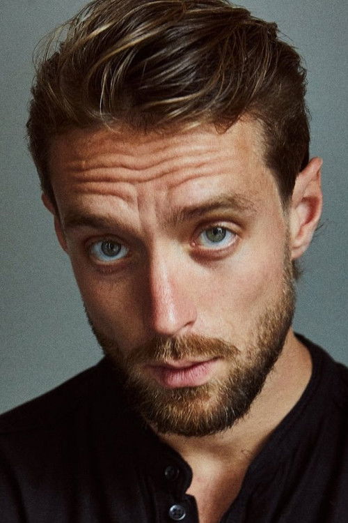 Niels Justesen as The Suited Man